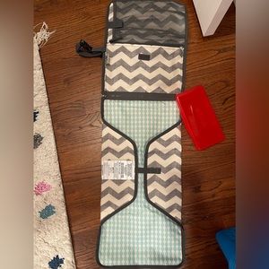 Skip hop portable changing station, never used